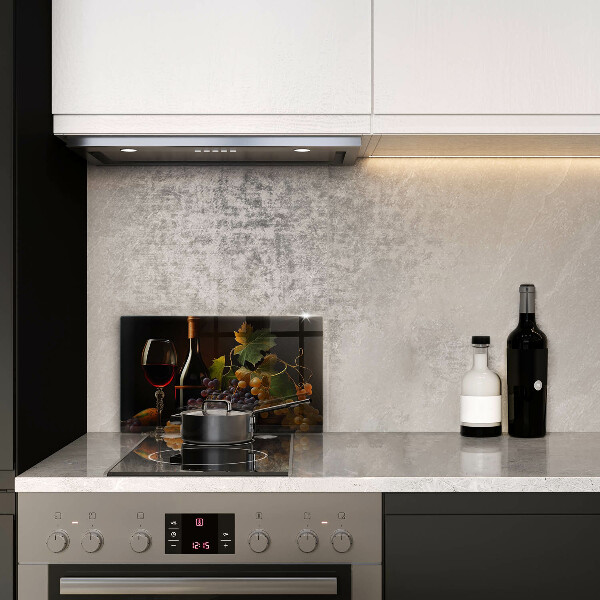 Tampa da placa de indução Um copo de vinho e uvas