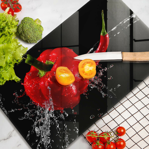 Tampa de parede do fogão a gás Pimentões vermelhos em água