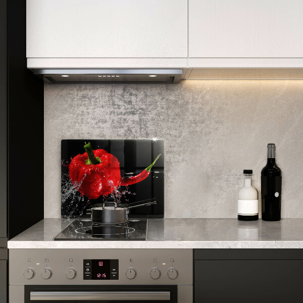 Tampa de parede do fogão a gás Pimentões vermelhos em água